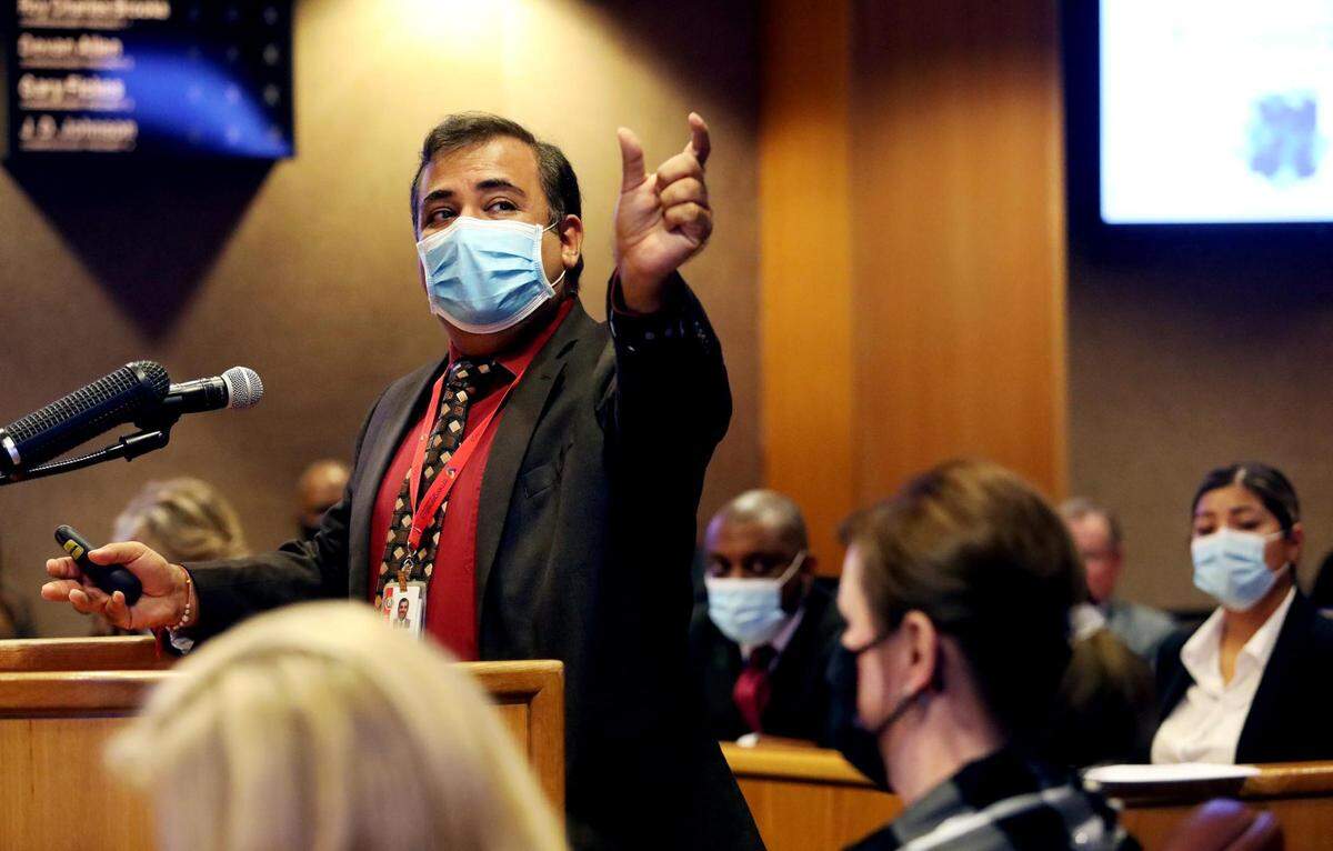Tarrant County Public Health Director Vinny Taneja gives the Tarrant County Court of Commissioners an update on the status of COVID-19 following an end of year surge on January 4, 2022. Taneja said positivity rate at testing sites and hospitalizations have increased and stressed preventative measures such as masking, social distancing and vaccination.
