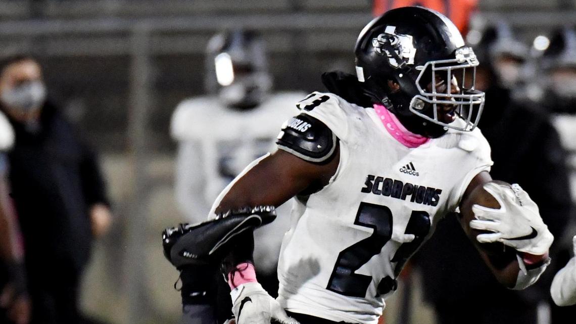 Trimble Tech’s Cameron Linwood, left is knocked down by South Hills’s Ca’ lub Holloway as he runs for his second touchdown to take a 13-2 lead in the fourth quarter of their Division District 4-5A football game Thursday, October 29, 2020 at Clark Stadium in Fort Worth, Texas. South Hills’s won 21-2. Special/Bob Haynes