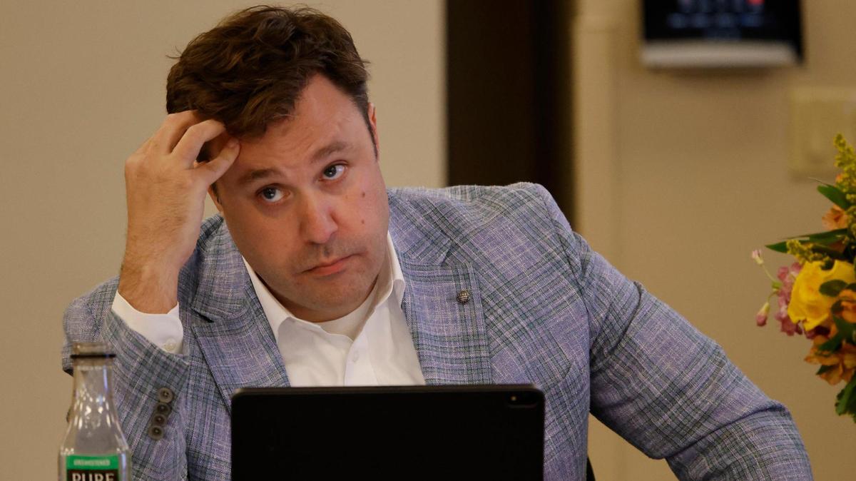 Tim Davis listens to a presenter during a JPS Health Network monthly Board of Managers Meeting in the OPC Auditorium at John Peter Smith Hospital in Fort Worth, Texas, Thursday, May 08, 2025.