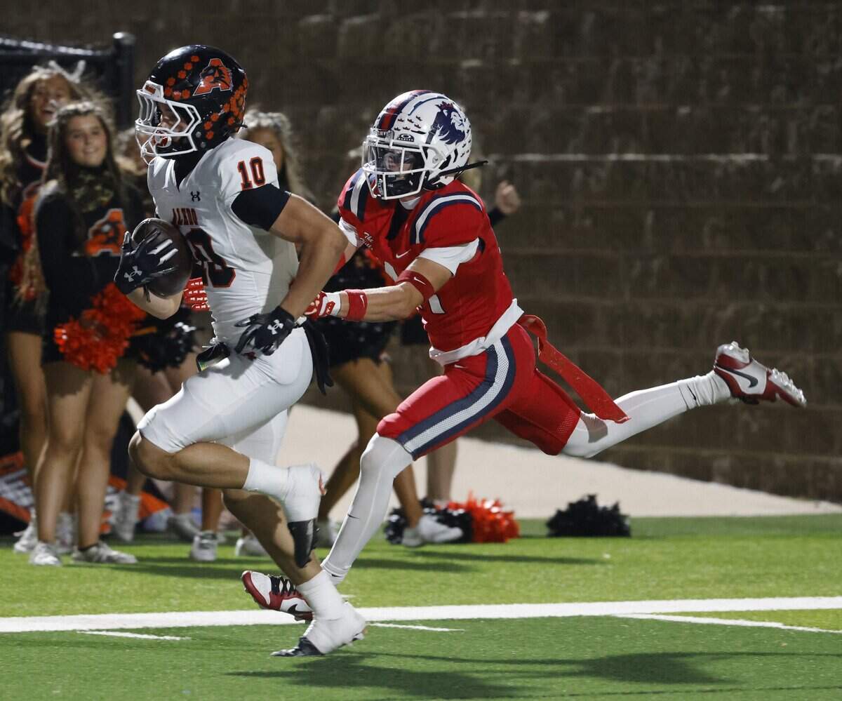 Aledo wide receiver Bayne Martin (10) beats North Richland Hills Richland defensive back Paxon Weeks (41) to the end zone during the first half of a UIL football game on Thursday, October, 23, 2025 at Birdville FAAC Stadium in North Richland Hills, Texas.