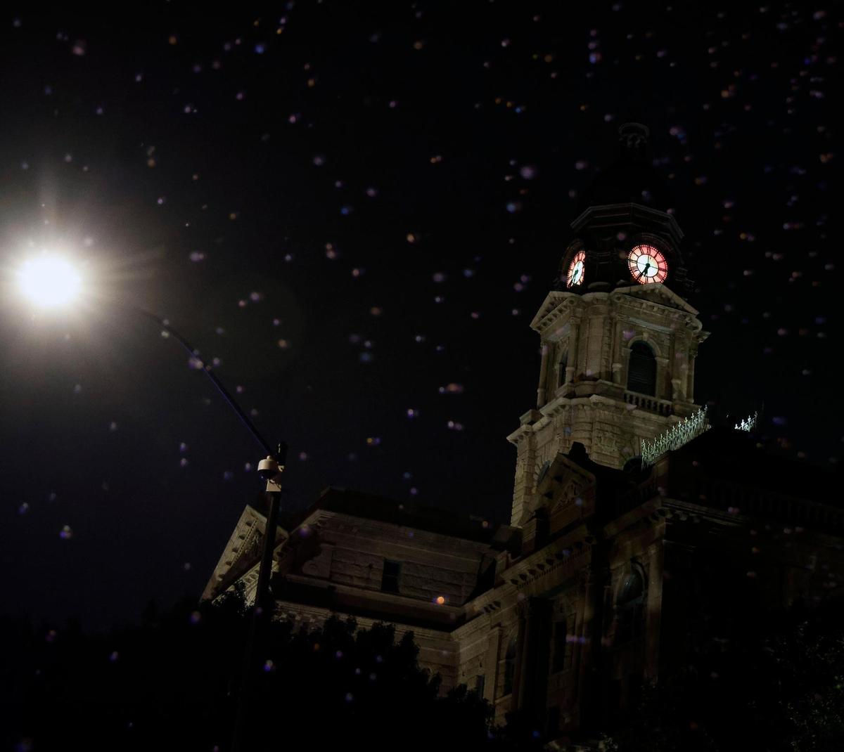 Artificial snow filled the air around the Tarrant County Courthouse during the 2023 GM Financial Parade of Lights.