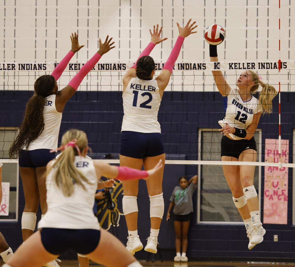 Byron Nelson outside hitter Ashlyn Seay (right) returns against Keller on Oct. 14.