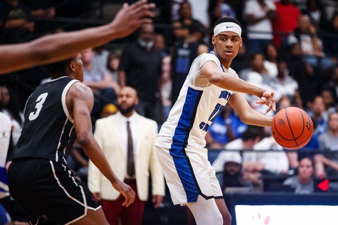 North Crowley forward Trey Hall (11) attempts to make a pass facing a Coppell defender in a UIL 6A D1 regional semifinal at Timberview High School in Arlington, Texas, Tuesday, March 3, 2026.
