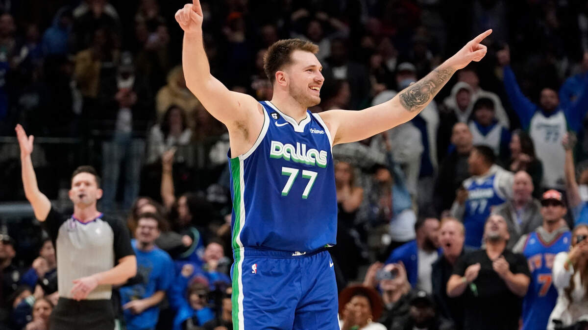 Dallas Mavericks guard Luka Doncic (77) celebrates scoring the game tying basket during the fourth quarter of the team’s NBA basketball game against the New York Knicks in Dallas on Tuesday.