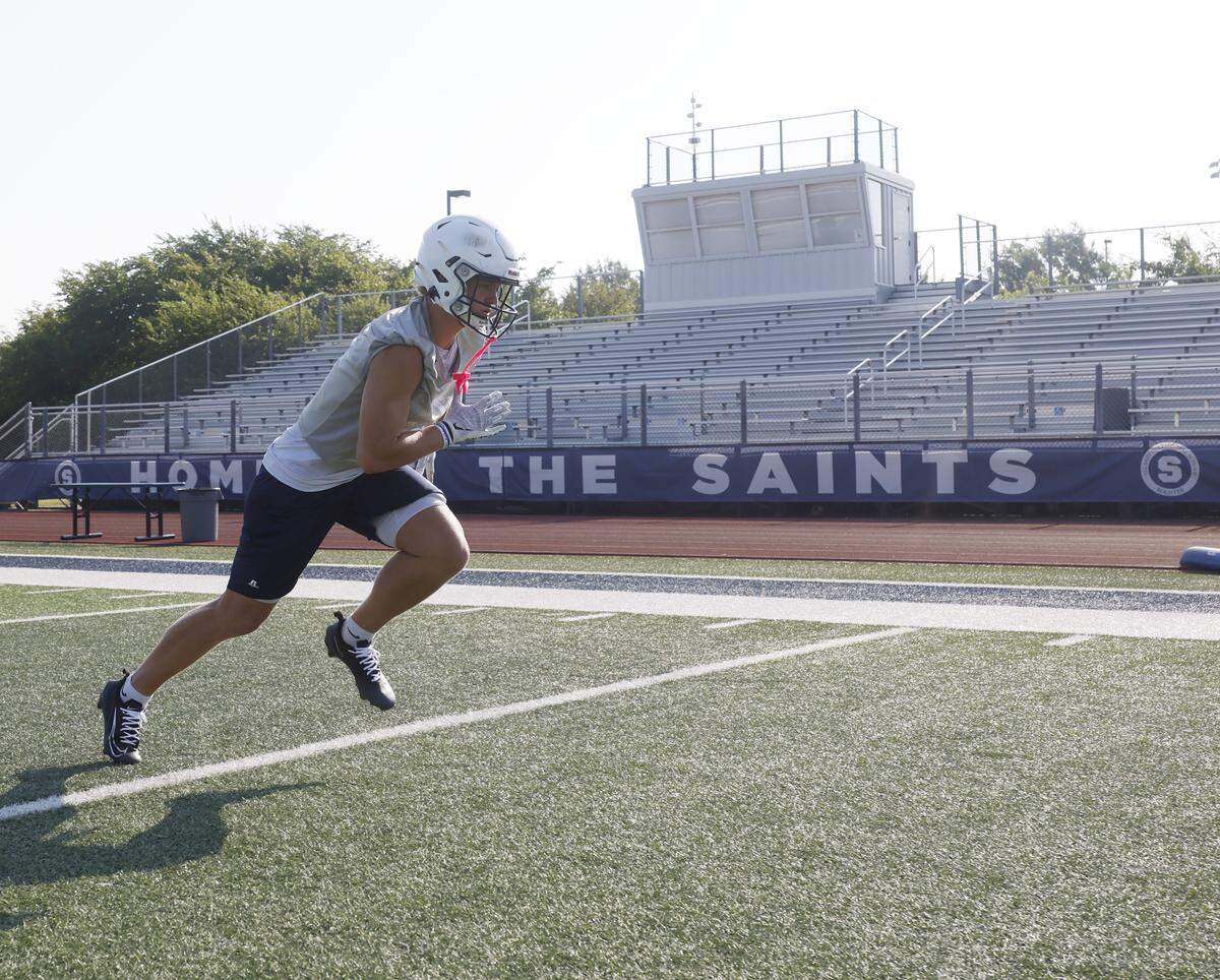 Wide receiver Hudson Reasor runs a route in the early morning of the first practice of 2025 for the All Saints in Fort Worth, Texas, Tuesday August, 05, 2025.