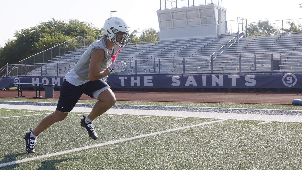 Wide receiver Hudson Reasor runs a route in the early morning of the first practice of 2025 for the All Saints in Fort Worth, Texas, Tuesday August, 05, 2025.

