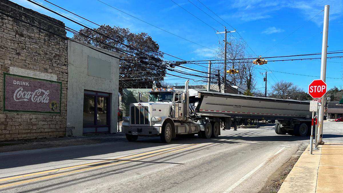 A rock hauler heads toward Texas 144 heading out of Glen Rose’s downtown.