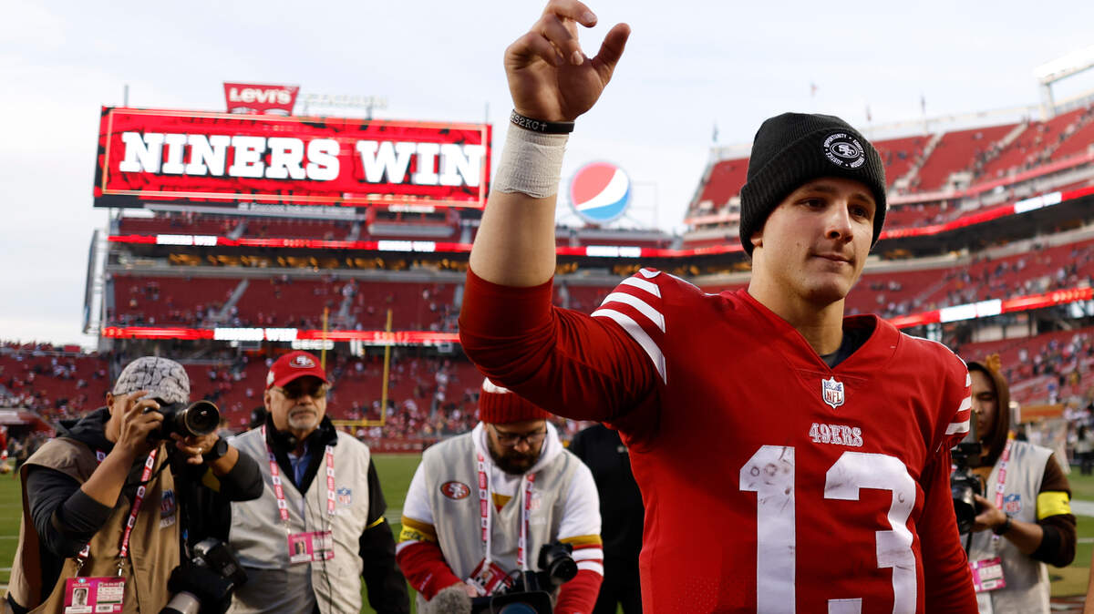 San Francisco 49ers quarterback Brock Purdy gestures as he walks off the field after beating the Washington Commanders on Saturday.