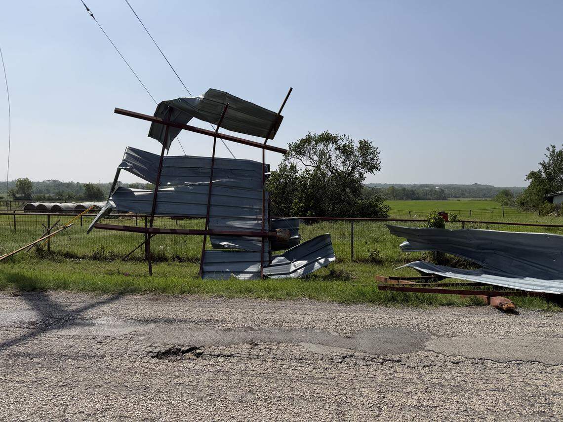 Mangled metal along a road in the Springtown, Texas, area after a tornado touched down on Saturday, April 25, 2026.