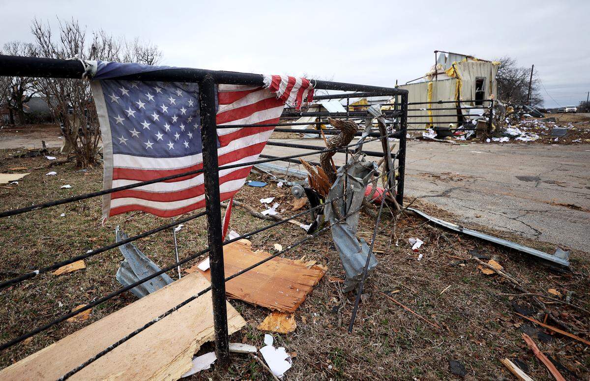 Damaged homes line North 9th Street in Jacksboro on Tuesday, March 22, 2022. Parts of the town suffered severe damage from a tornado.