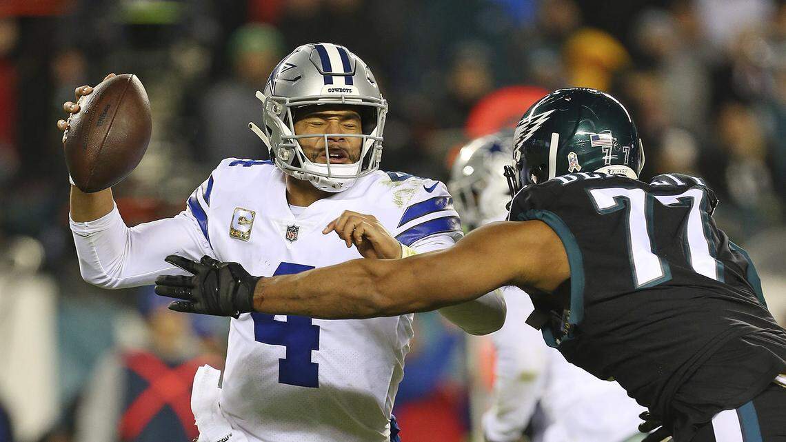 Dallas Cowboys quarterback Dak Prescott (4) is sacked by defensive end Michael Bennett #77 of the Philadelphia Eagles during an NFL football game on Sunday, Nov. 11, 2018, in Philadelphia. (AP Photo/Rich Schultz)