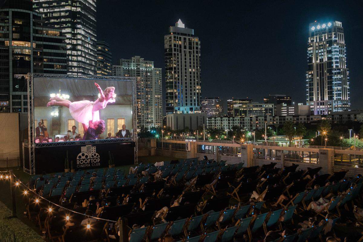 A Rooftop Cinema Club screening atop a Whole Foods and Frost bank building in Houston.