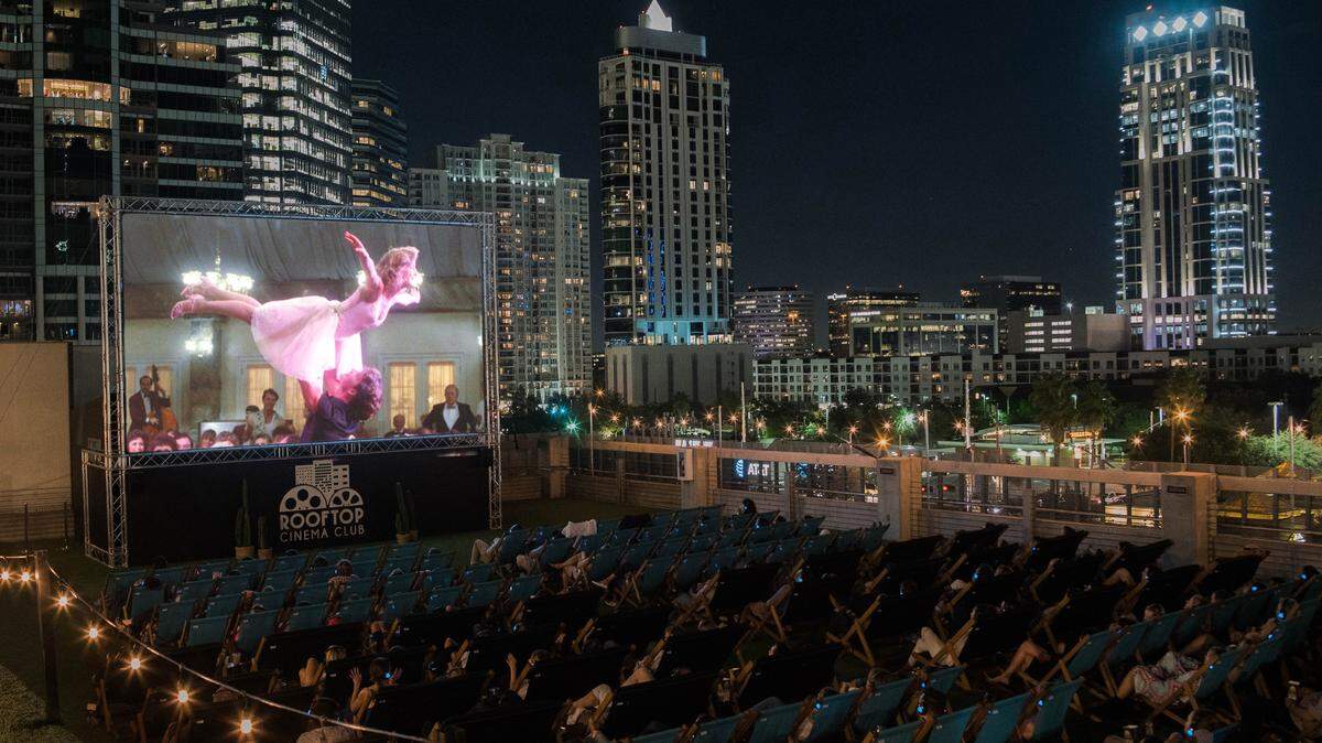 A Rooftop Cinema Club screening atop a Whole Foods and Frost bank building in Houston.