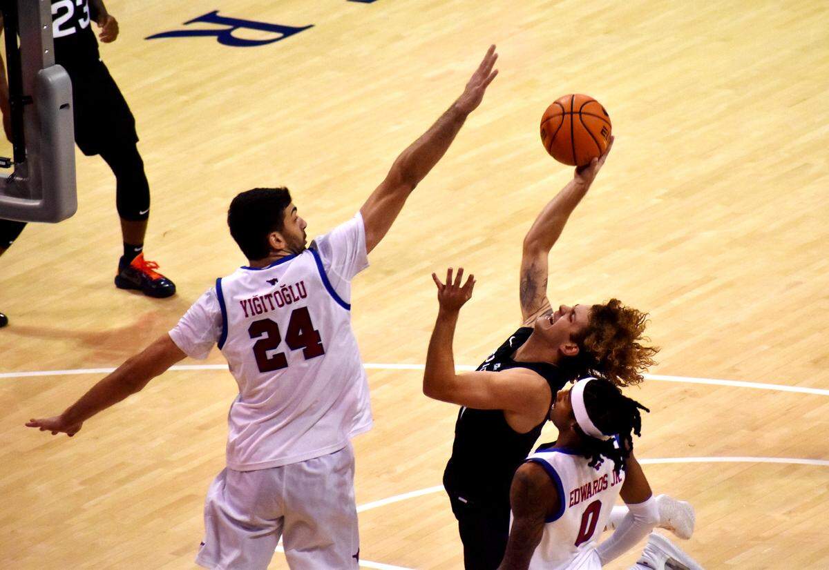 Butler's Finley Bizjack, a Byron Nelson High School standout, attacks the rim against SMU on Nov. 15 at Moody Coliseum in Dallas.