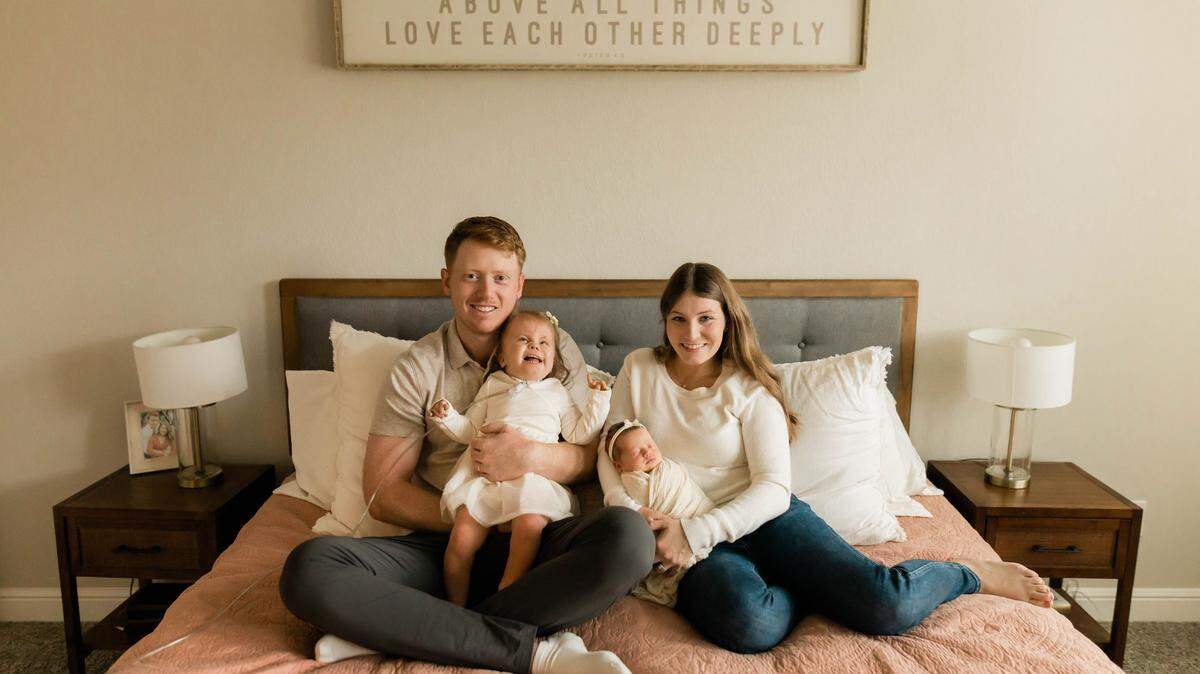 The Springers, Hayden and Emma, shown with their children Sage and Annie Claire, started the Extra To Love nonprofit organization to help families with trisomy genetic conditions. Sage was born with trisomy 18, which ultimately took her life in November at age 3, much longer than most children born with trisomy 18 or 13 live.
