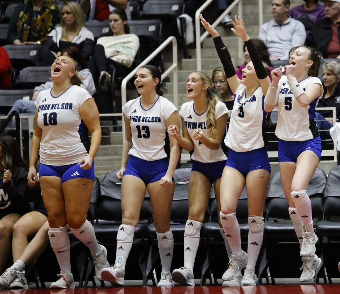 Trophy Club Byron Nelson Lady Cats bench erupts after a point against Pearland Dawson during the third set of the UIL Class 6A Division I state volleyball championship game Saturday Nov. 22, 2025 at Curtis Culwell Center in Garland, Texas.