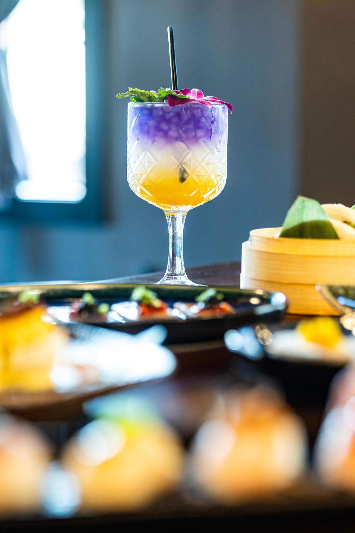 The Purple Mango cocktail at Hush Sushi, Kitchen and Bar in Keller, Texas on Thursday, Aug. 24, 2023.