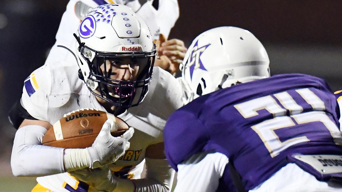 Granbury’s Clayton Kracy evades Chisholm Trail’s Jae’Marcus Allen as he gets a first down in the fourth quarter Friday during a football game at Chisholm Trail High school in Fort Worth. Granbury went on to win 31-7.