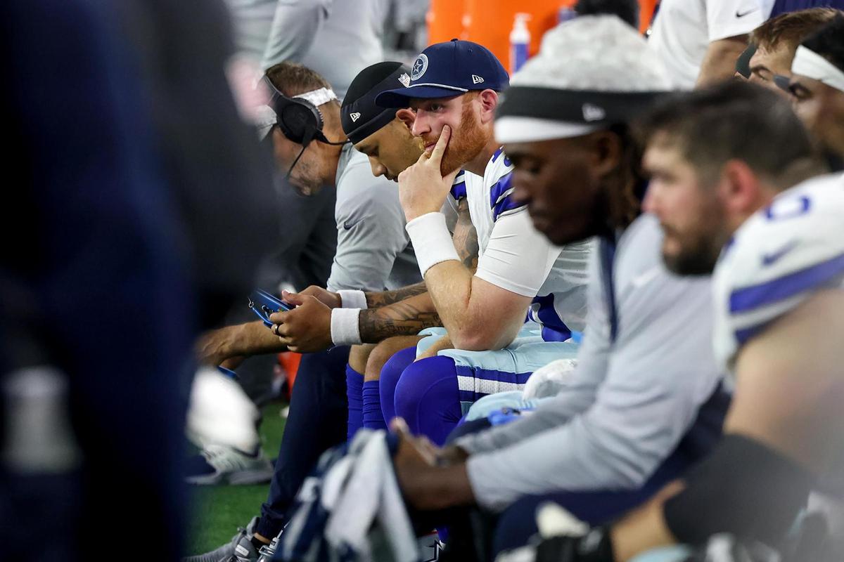 Dallas Cowboys quarterback Cooper Rush sits on the sidelines during the final minutes of their loss against the Philadelphia Eagles on Sunday, Nov. 10, 2024, at AT&T Stadium.