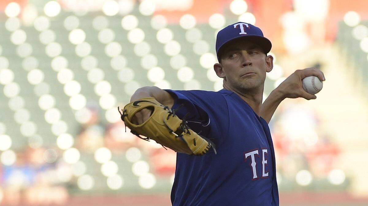 Texas Rangers starting pitcher Mike Minor (36) working during the first inning as the Rangers play the Padres at Globe Life Park in Arlington, TX, Wednesday, June 27, 2018.