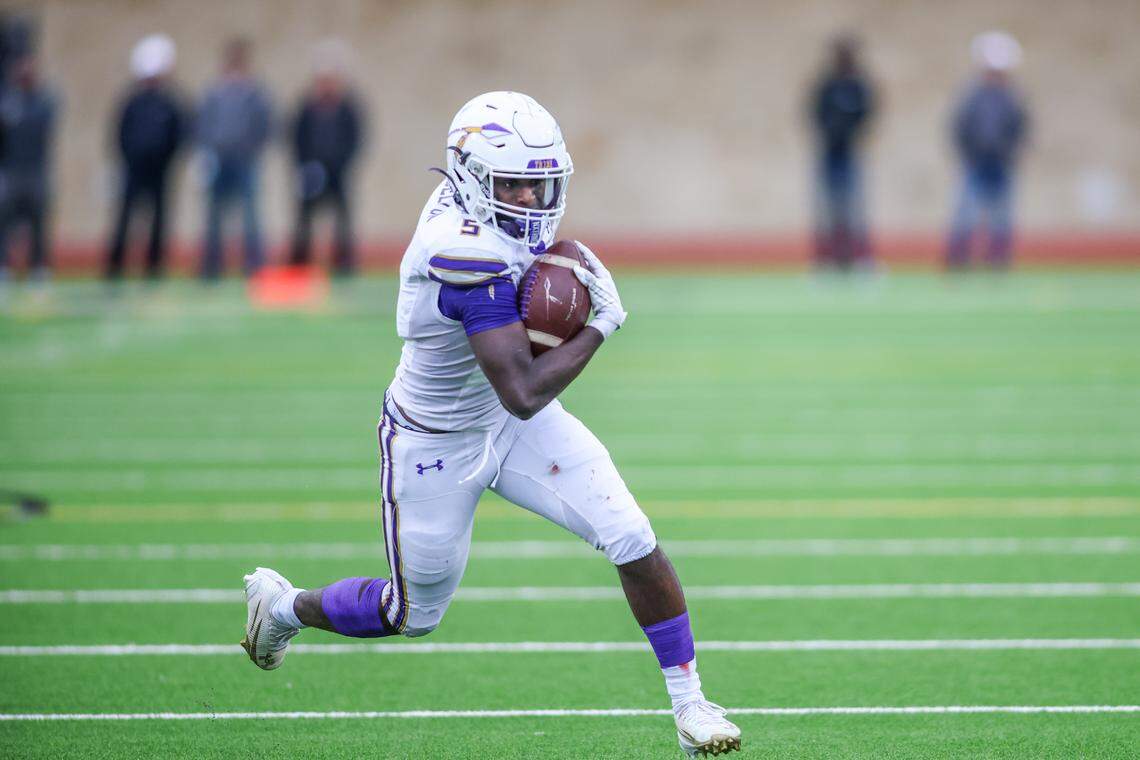 Alvarado running back Demarcus Belton gets around the end of Springtown’s defense during a Class 4A Division I regional semifinal Friday, Nov. 28, 2025, at Knight Stadium at Eagle Mountain High School in Fort Worth.