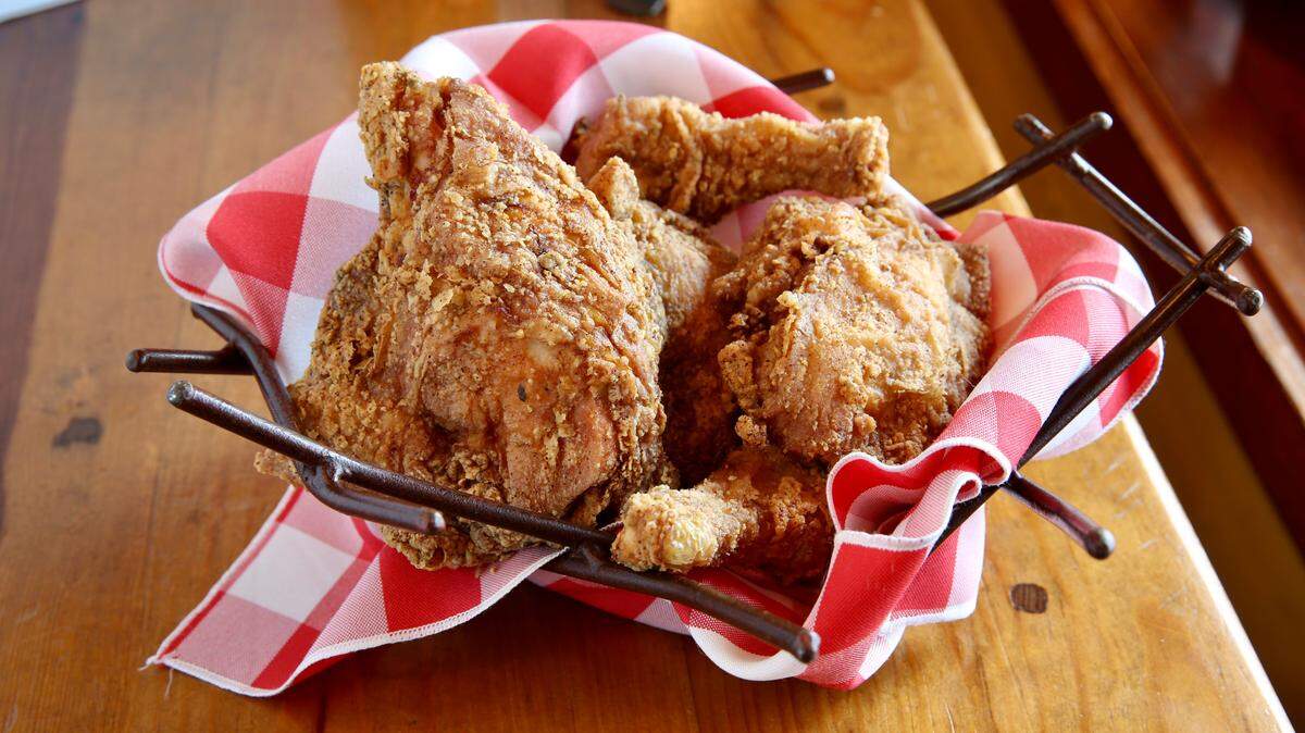 Reata’s fried chicken with poblano-bacon grits is now on the daily lunch menu.