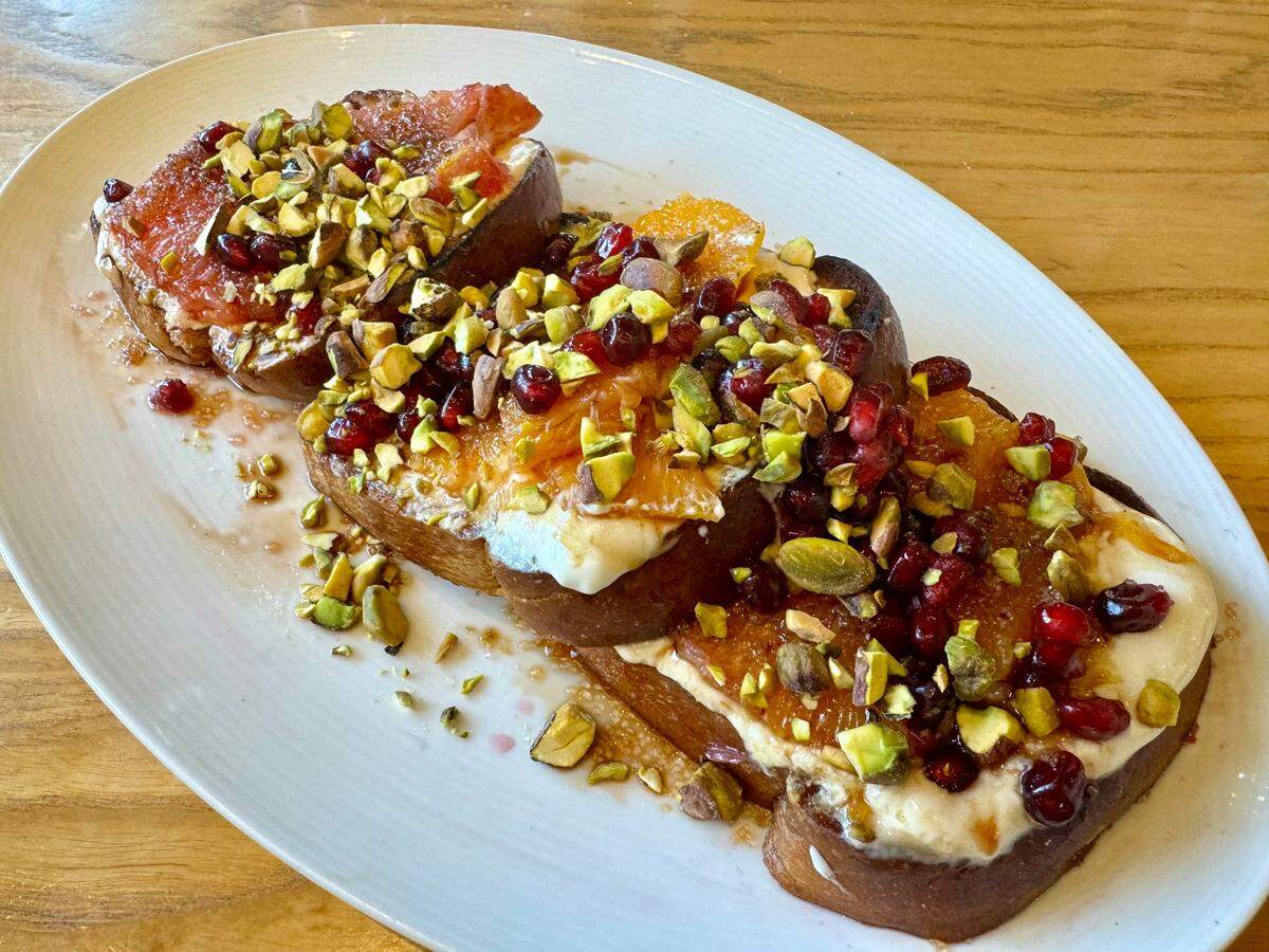Ricotta toast with orange, grapefruit and pistachios at Taste Project’s community restaurant Feb. 17, 2024.