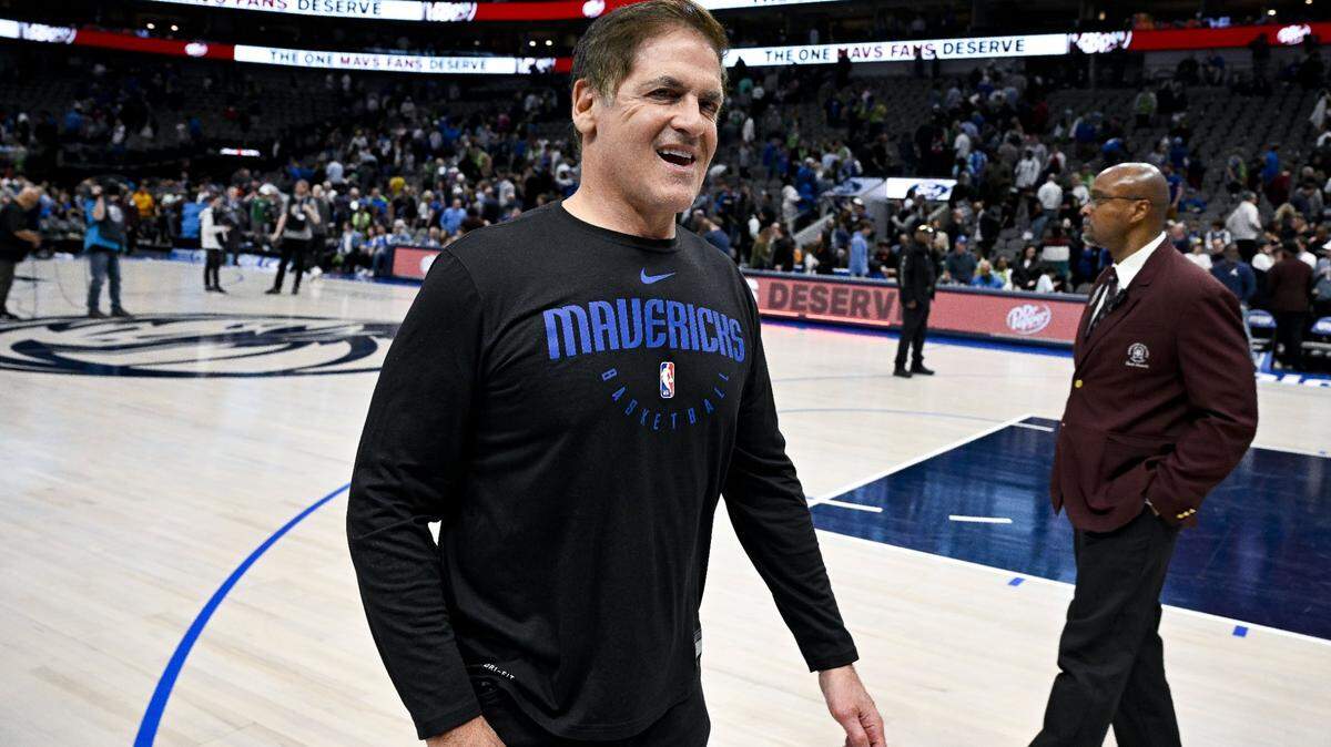 Dallas Mavericks owner Mark Cuban , walking off the court after a game in April, has agreed to sell a majority take in the franchise.