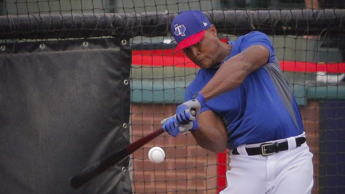 Rangers third baseman Adrian Beltre hit batting practice on the field at Globe Life Park before Thursday's game for the first time since a left strained hamstring put him on the disabled list on April 25. Beltre also took ground balls at third base.