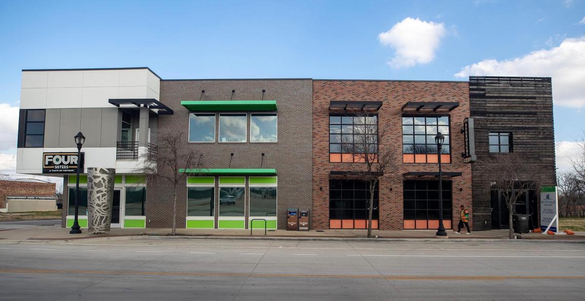 An unoccupied building sits empty next to a restaurant on South Main Street in Fort Worth on Wednesday.