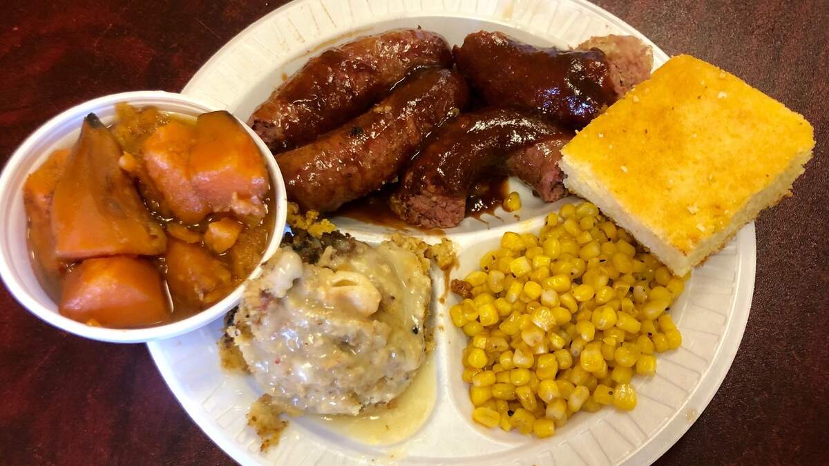 A combination plate with housemade spicy and mild beef and pork sausage at the Sausage Shoppe.