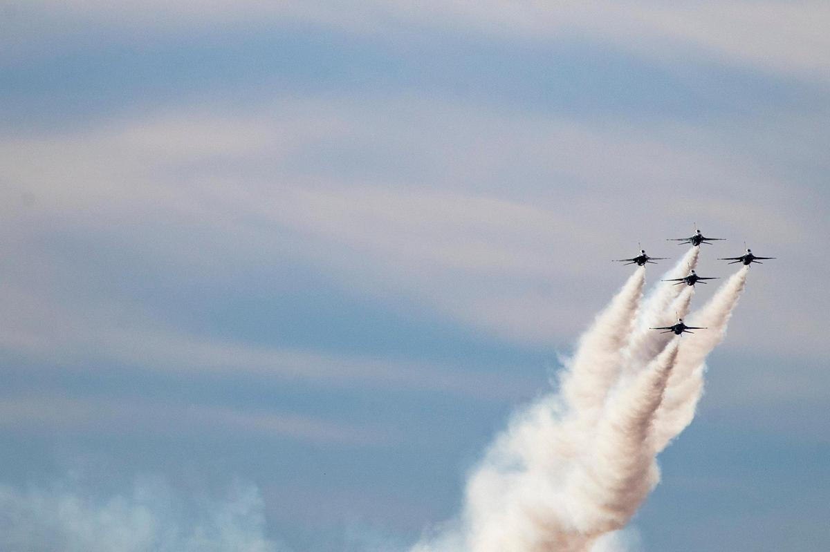 A squadron of U.S. Air Force Thunderbirds performs a maneuver across the airspace above the Fort Worth Alliance airport during the AllianceTexas Aviation Expo presented by Bell in Fort Worth on Saturday, Oct. 22, 2022.