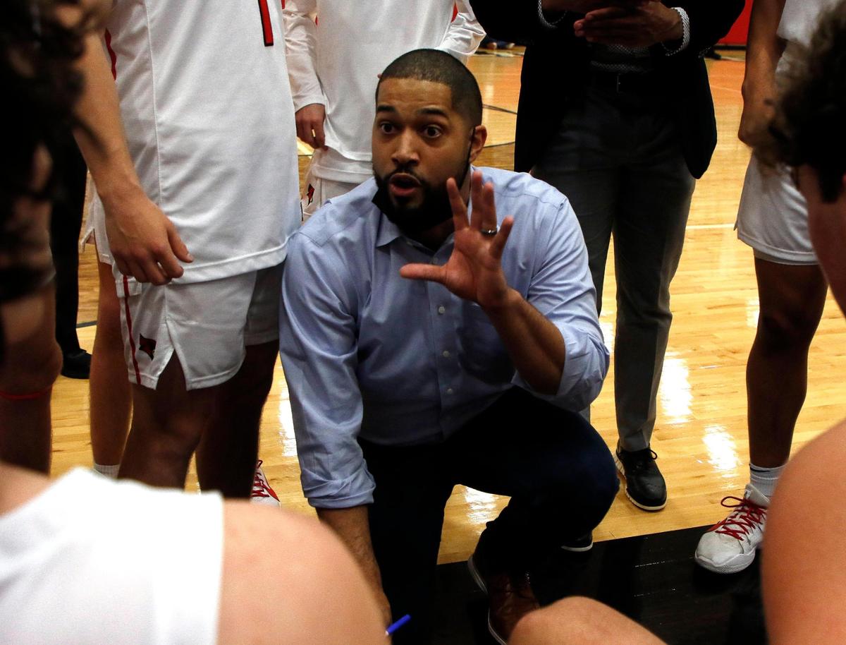 Fort Worth Christian head coach Steve Mawirea talks to the team during a timeout during the TAPPS 5A State Semifinal basketball game at Colleyville Heritage High School in Colleyville, Texas, Tuesday, March 09, 2021. Fort Worth Christian led 38-27 at the half. (Special to the Star-Telegram Bob Booth)