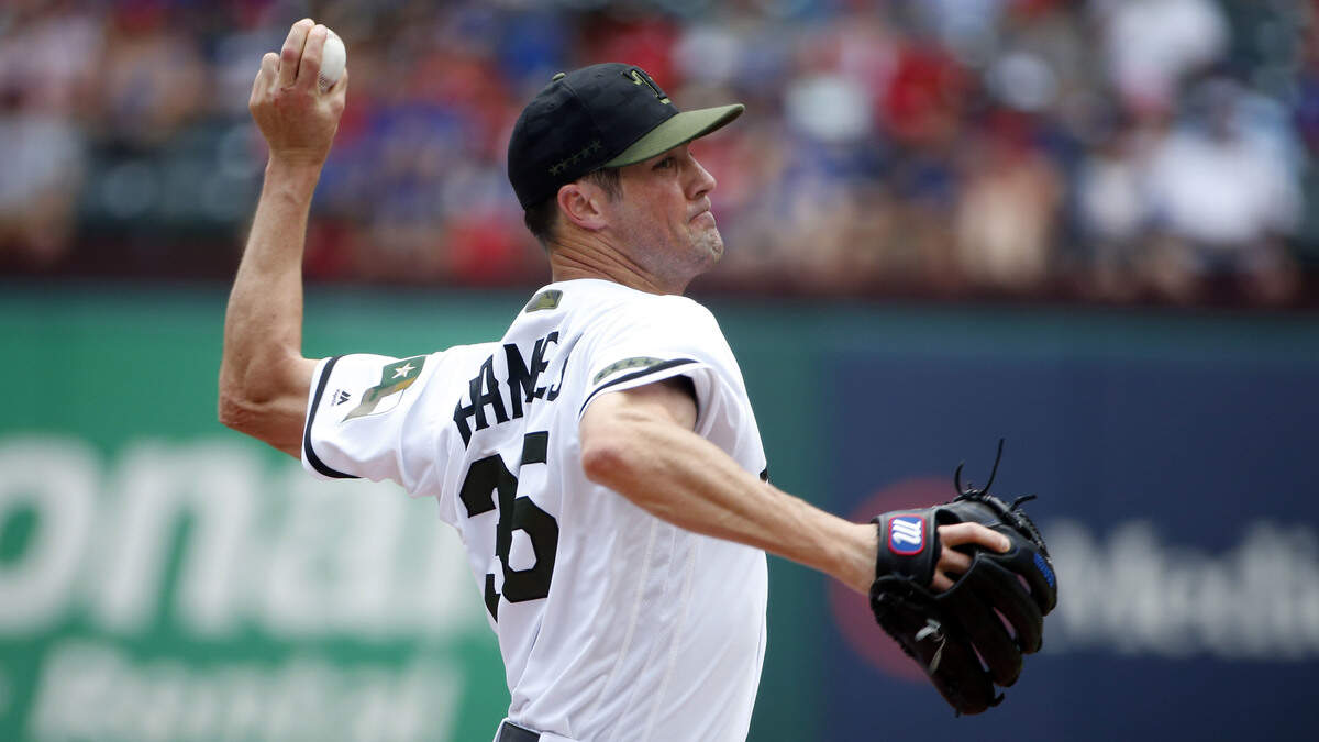 Rangers starter Cole Hamels struggled early Sunday against the Royals, giving up five runs in the first three innings.