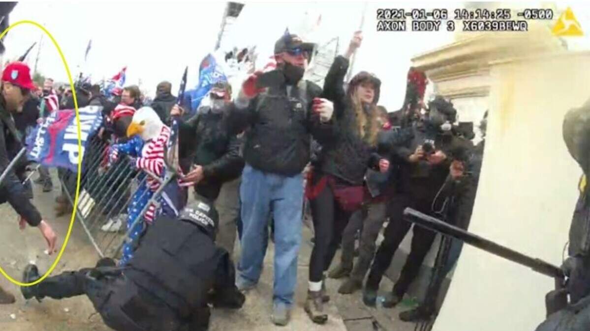 Jason Farris, 45, of Arlington, (circled in yellow) admitted to assaulting, resisting and interfering with law enforcement officers at the Capitol on Jan. 6, 2021, according to court documents.