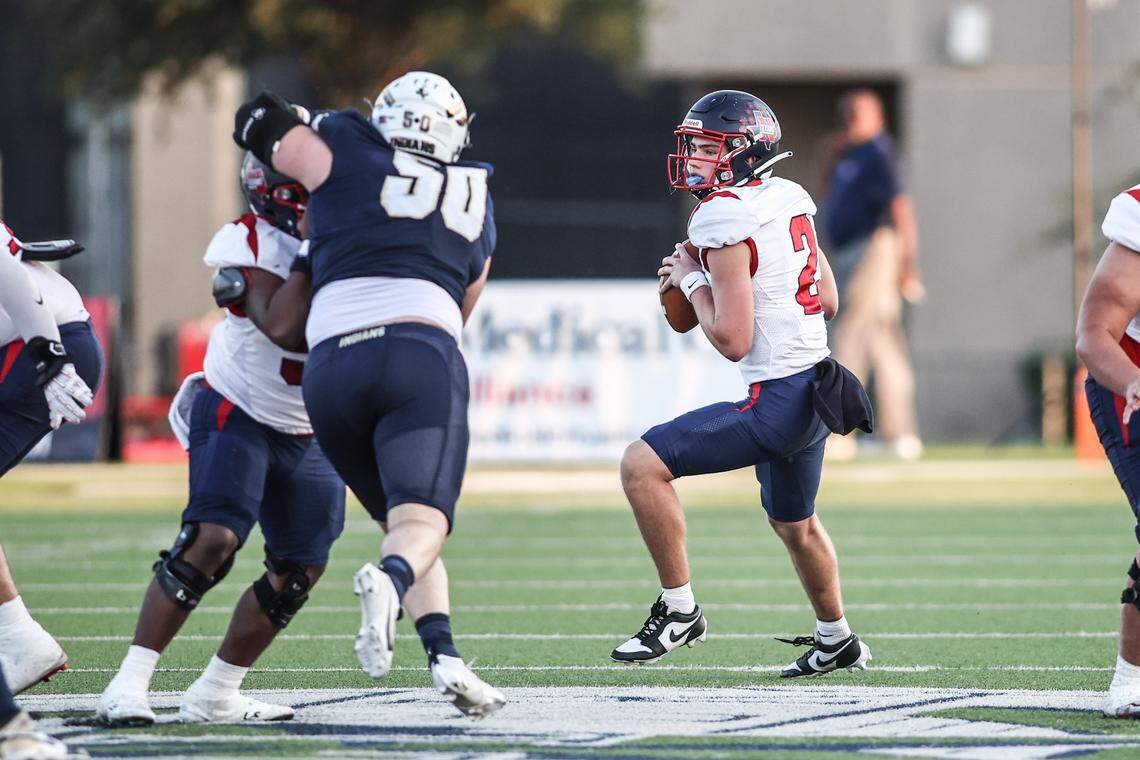Northwest High School quarterback Mark Hartman (2) looks over the Keller defense In Friday’s District 4-6A game at Keller ISD Stadium. Tom Marvin / Special to the Star-Telegram