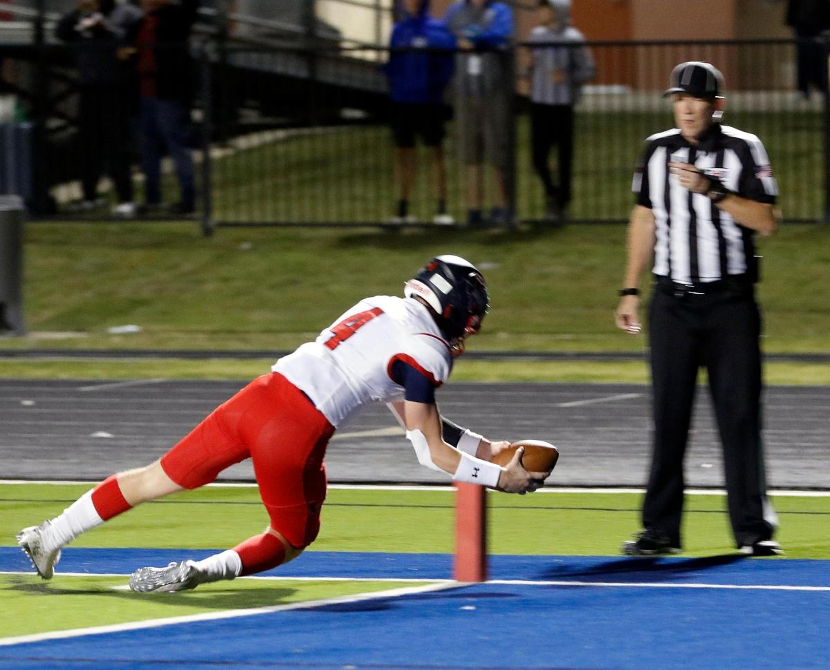 Northwest quarterback Jake Strong (4) dives across the pylon in a District 3-5A football game at Bear Stadium in White Settlement, Texas, Friday Oct. 29, 2021. Northwest led 21-10 at the half. (Special to the Star-Telegram Bob Booth)