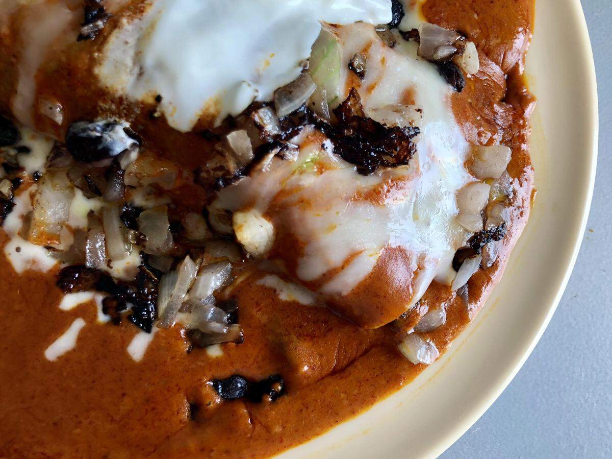 The “secret menu” New Mexico red chile enchiladas at Enchiladas Ole.