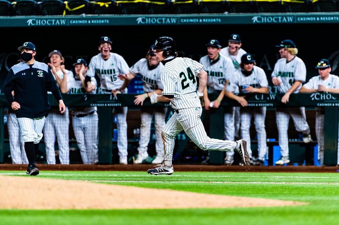 Gunnar Krug (24) runs towards 1st base during a game between Carroll and Prosper at Globe Life Field in Arlington during the High School Baseball Showcase on February 28, 2021. Photo by Matt Smith. (Special to the Star-Telegram).