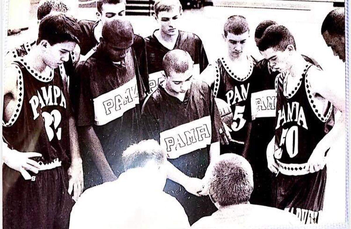 Robert Hale coaching boys basketball at Pampa.