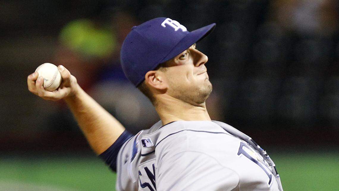 Tampa Bay Rays starting pitcher Drew Smyly (33) pitches against the Texas Rangers a baseball game at Globe Life Park Monday, August 11, 2014 in Arlington TX. (Star-Telegram/ Richard W. Rodriguez)