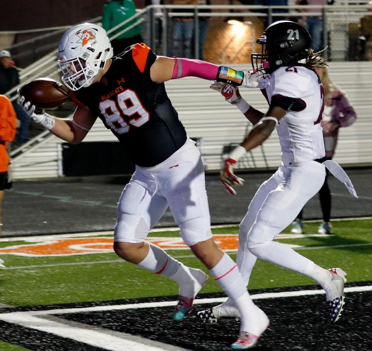 Aledo tight end Jason Llewellyn (89) makes a finger tipped catch at the back of the end zone in front of Timberview corner back Chancellor Anthony (21) to put the final score on the board in a high school district 5-5A division 2 football game at Bearcat Stadium in Aledo, Texas, Friday Oct. 15, 2021. Aledo defeated Timberview 35-21. (Special to the Star-Telegram Bob Booth)