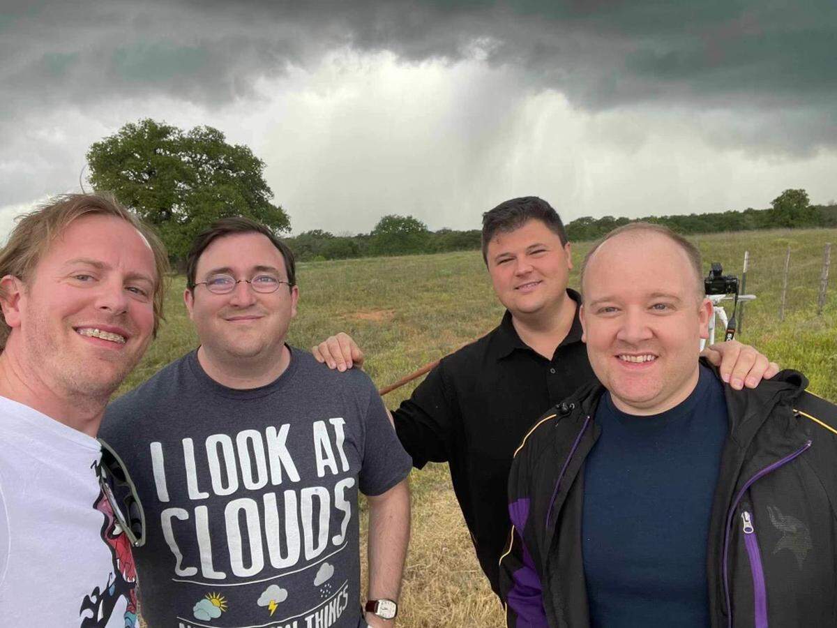 WFAA meteorologist Jesse Hawila (black shirt) out storm chasing.