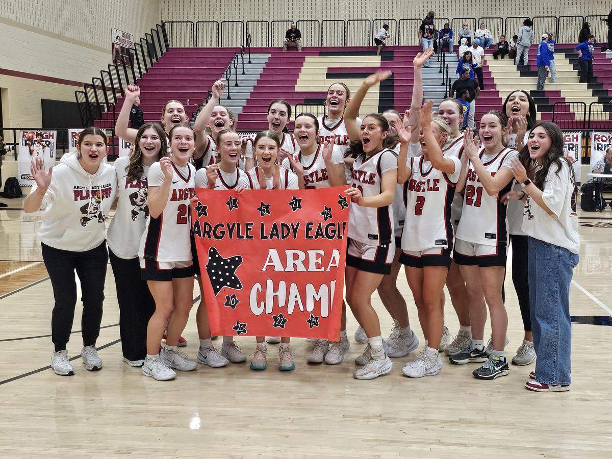 The Argyle girls basketball team celebrates after a hard-fought game against Mansfield Summit in a UIL Class 5A Division II area-round playoff game on Thursday, February 19, 2026 at Saginaw High School in Saginaw, Texas.