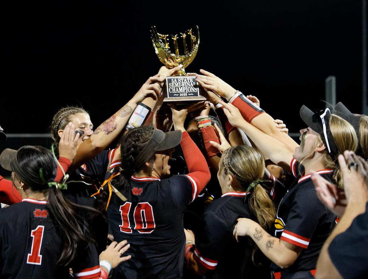 The Cardinals celebrate winning the UIL softball state semifinals 5A D1 playoff game at Trojan Softball Field in Euless, Texas, Wednesday, May 21, 2025.