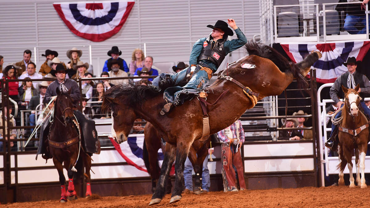 Jake Brown of Cleveland, Texas, competing Friday during the opening night of the Fort Worth Stock Show Rodeo, advanced to the wild card round in bareback riding. Brown is excited about the new tournament format at Dickies Arena. “I am an old school guy and I like tradition, but this new coliseum and this new format is just amazing,” he said. “It takes Fort Worth to a whole new level.”