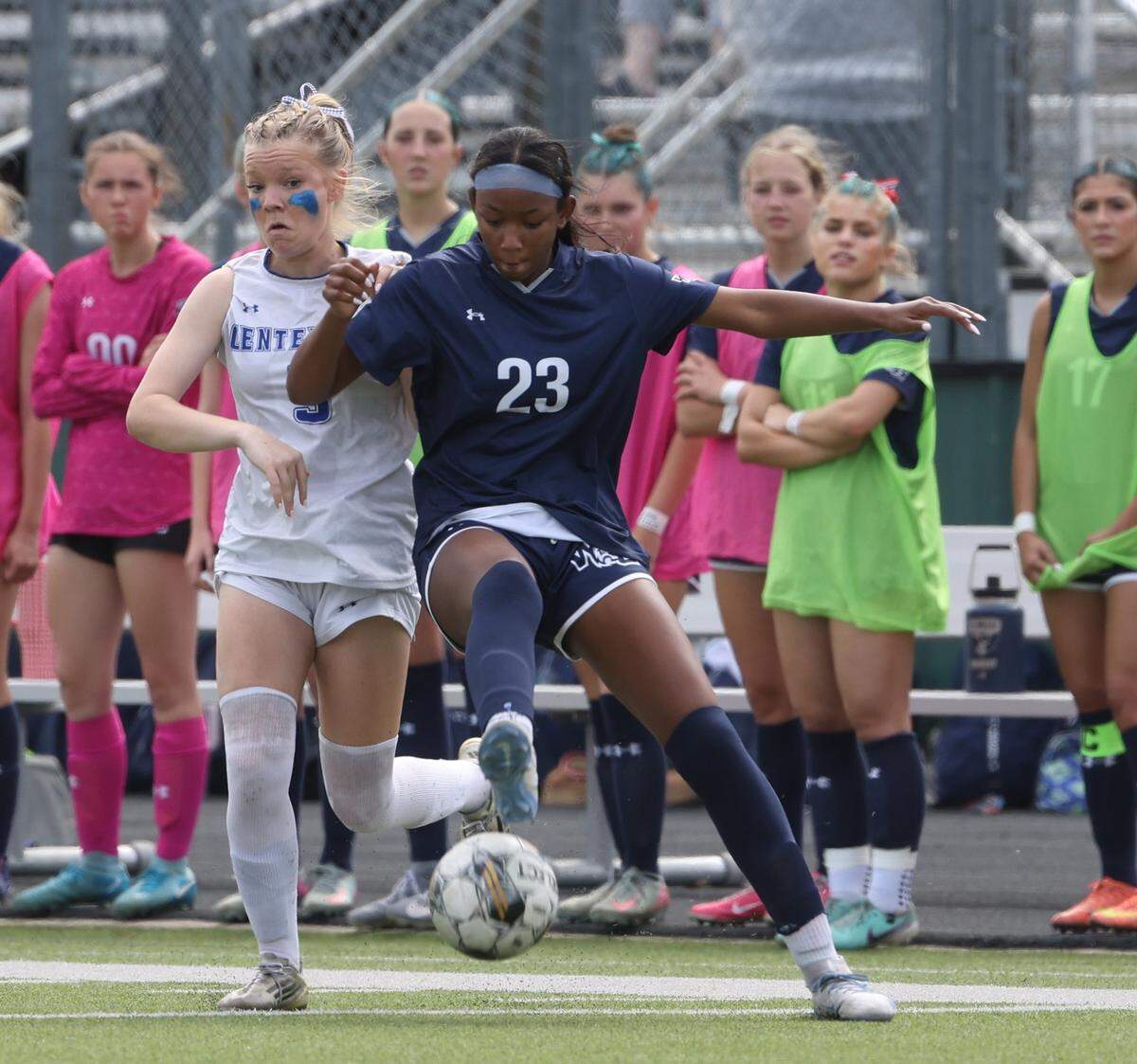 Prosper Walnut Grove defender Myla Ellis (23) fights to keep the ball away from Burleson Centennial midfielder Andie Hafner (5) during the second half of a UIL Conference 5A Division I state semifinal soccer game at Keller ISD Athletic Complex in Keller, Tx. Friday, April 03, 2026.