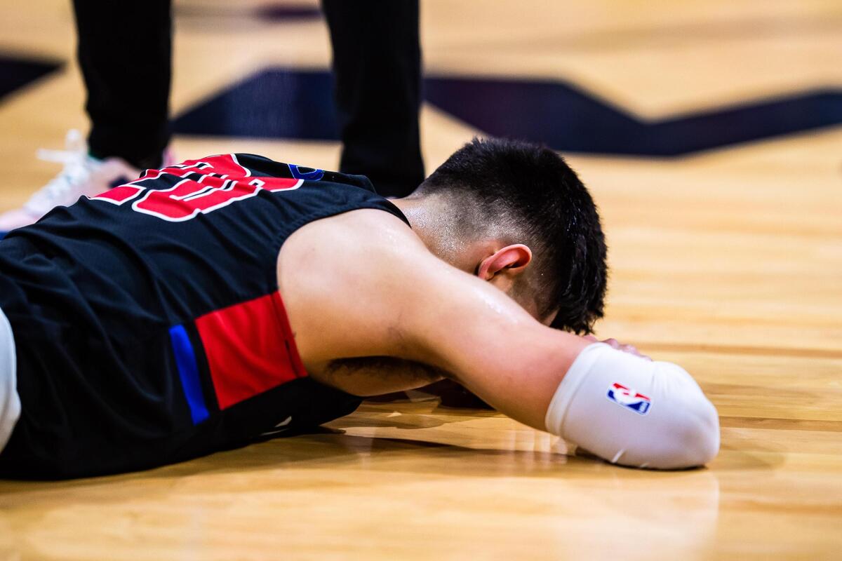 Juan Reyna (20) lays on the court after Duncanville beat Austin Westlake 66-53 in the 6A state final at the Alamodome in San Antonio Texas, on March 13, 2021. (Photo by Matt Smith. Special to the Star-Telegram).