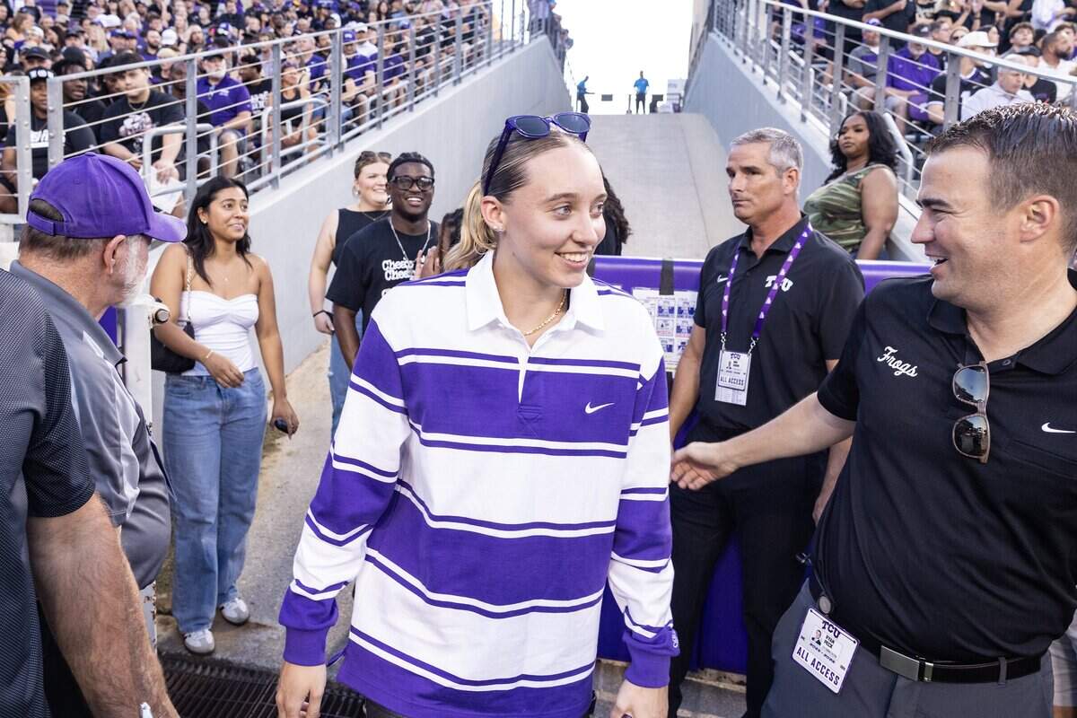 Dallas Wings guard Paige Bueckers arrives on field for an NCAA football game between TCU and Colorado at Amon G. Carter Stadium in Fort Worth on Saturday, Oct. 4, 2025.
