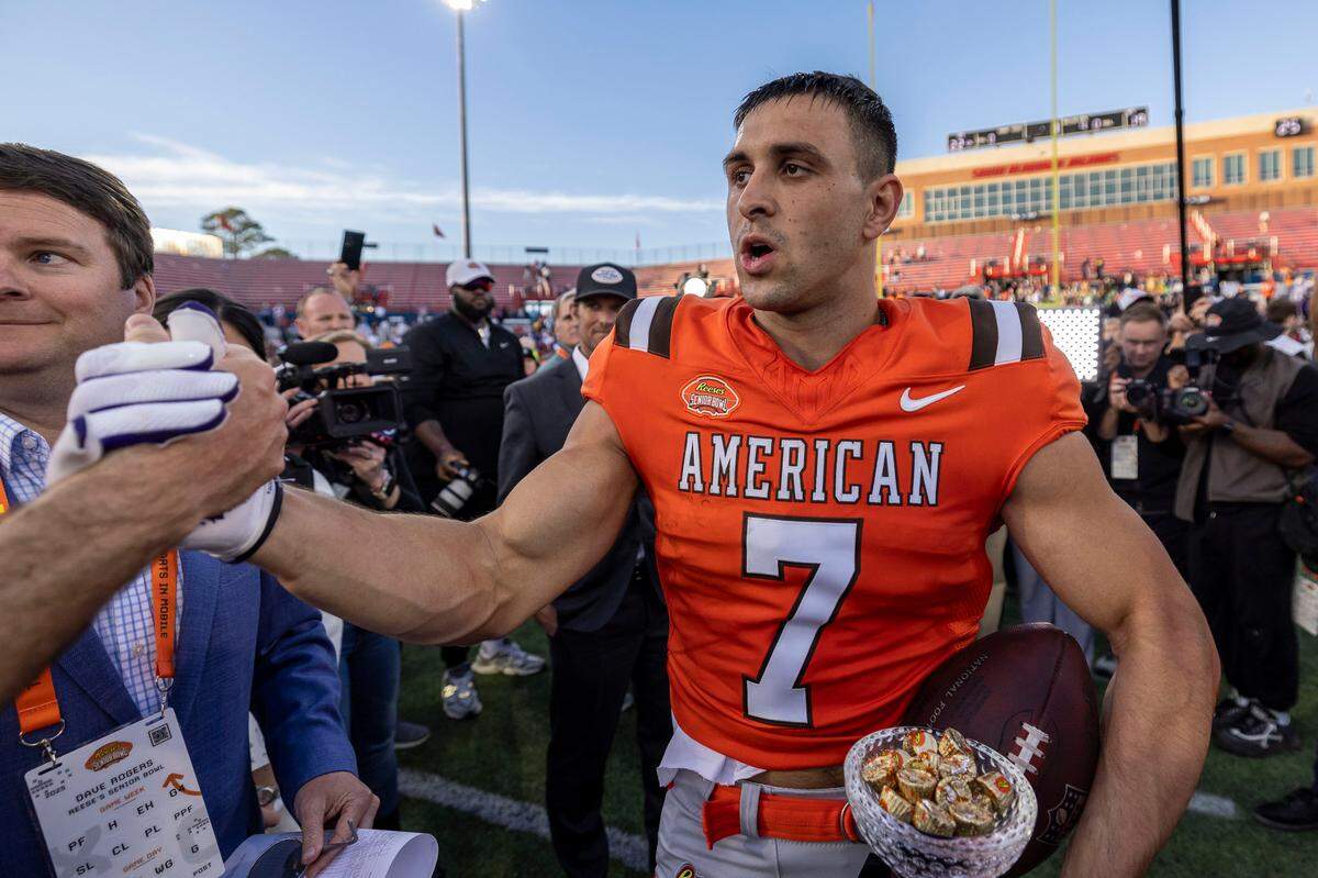 American team wide receiver Jack Bech of TCU (7) is celebrates after catching the game wining touchdown on the final play of the Senior Bowl at Hancock Whitney Stadium. Jack Bech recently lost his brother in the New YearÕs Day mass killing in New Orleans.